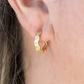 Gold-Tone Huggie Earrings with Sparkling Cubic Zirconia - Bella Boutique